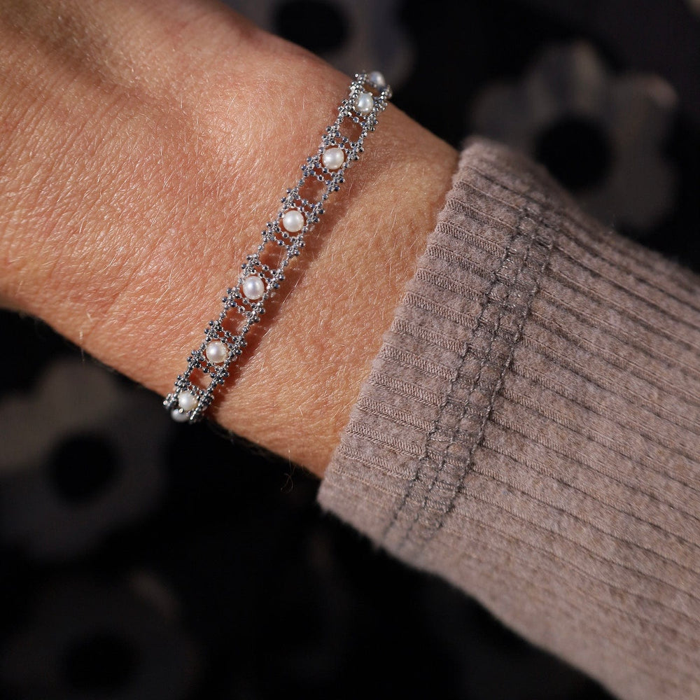 
                      
                        BRC Sterling Silver Woven Ladder Pearl Bracelet
                      
                    