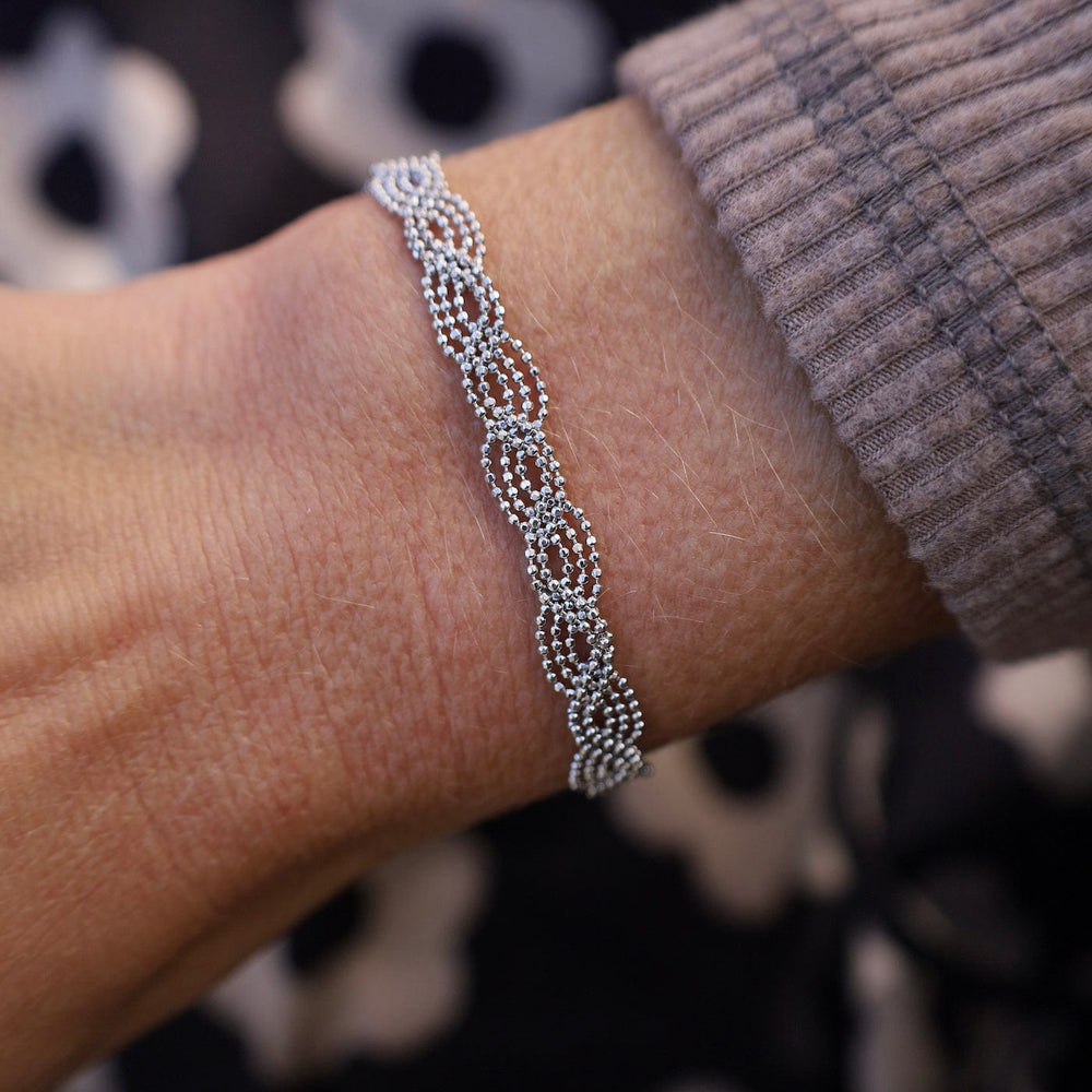 
                      
                        BRC Sterling Silver Woven Slender Twist Bracelet
                      
                    