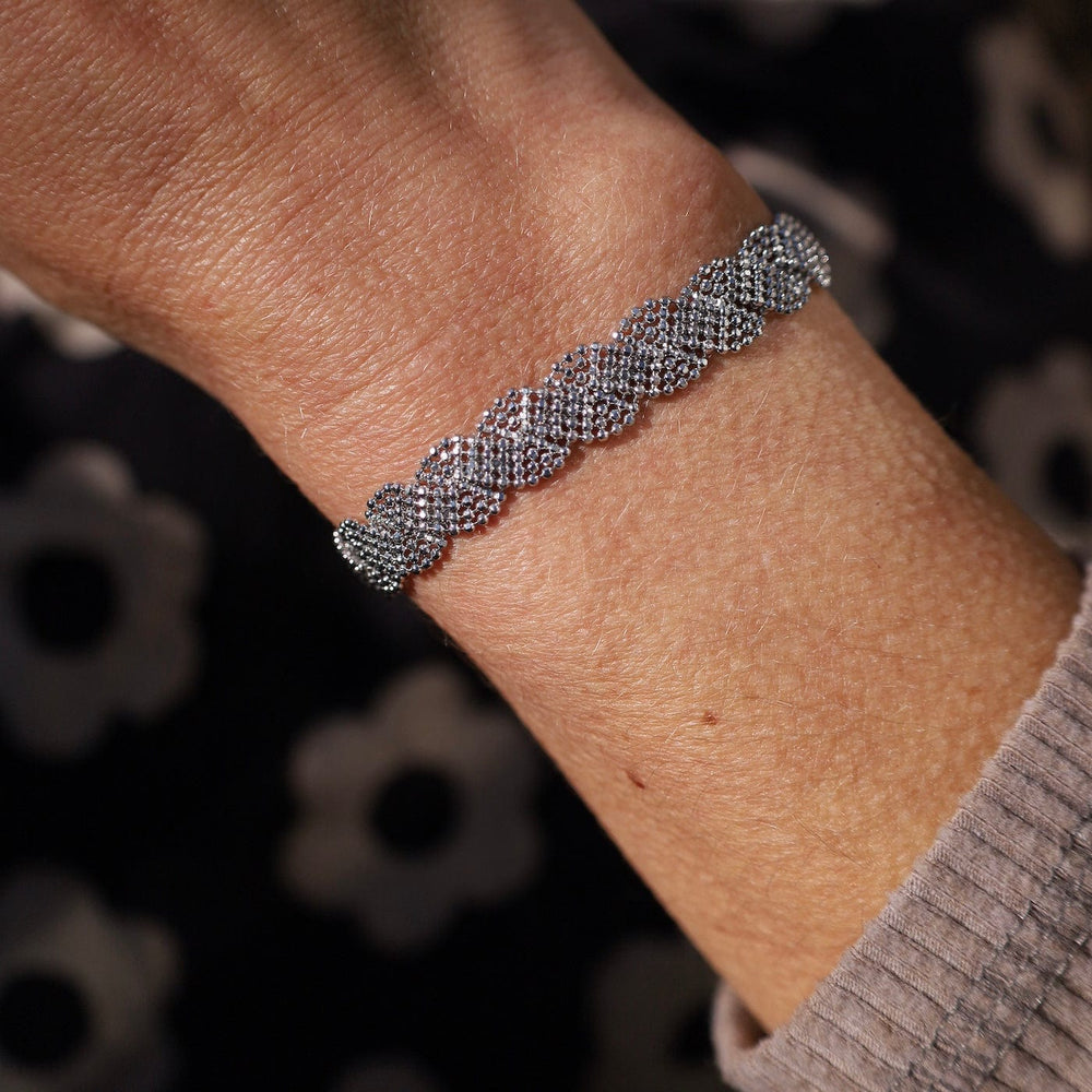 
                      
                        BRC Sterling Silver Woven Twist Bracelet
                      
                    