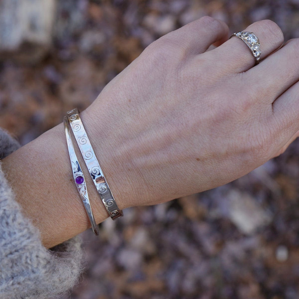 
                      
                        BRC Thin Etched Cuff with Amethyst Cabochon
                      
                    