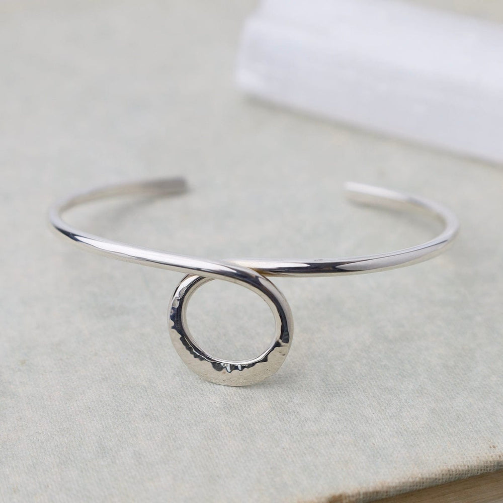 
                      
                        BRC Thin Hammered Cuff With Center Circle Loop
                      
                    