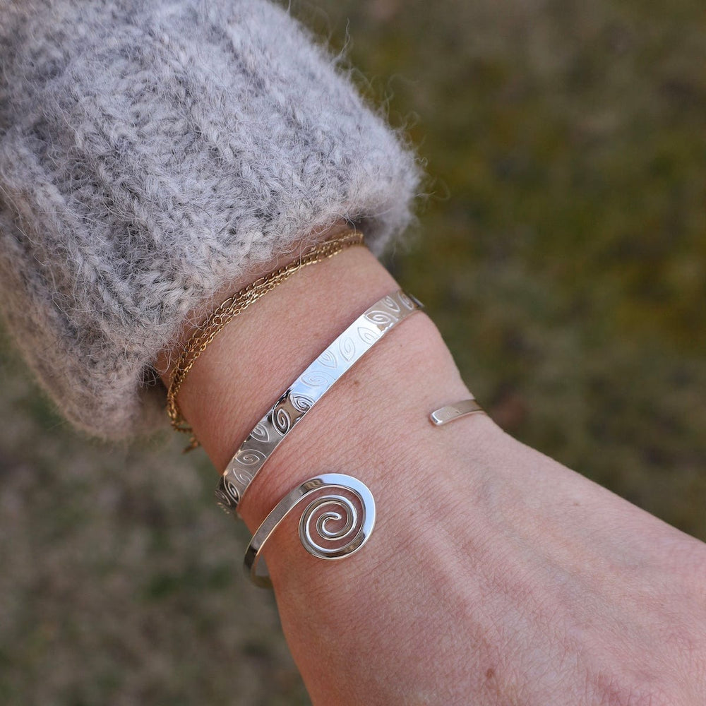 
                      
                        BRC Thin Hammered Cuff with Spiral End
                      
                    