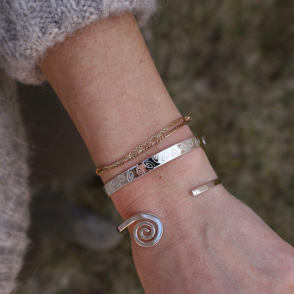 
                      
                        BRC Thin Hammered Cuff with Spiral End
                      
                    