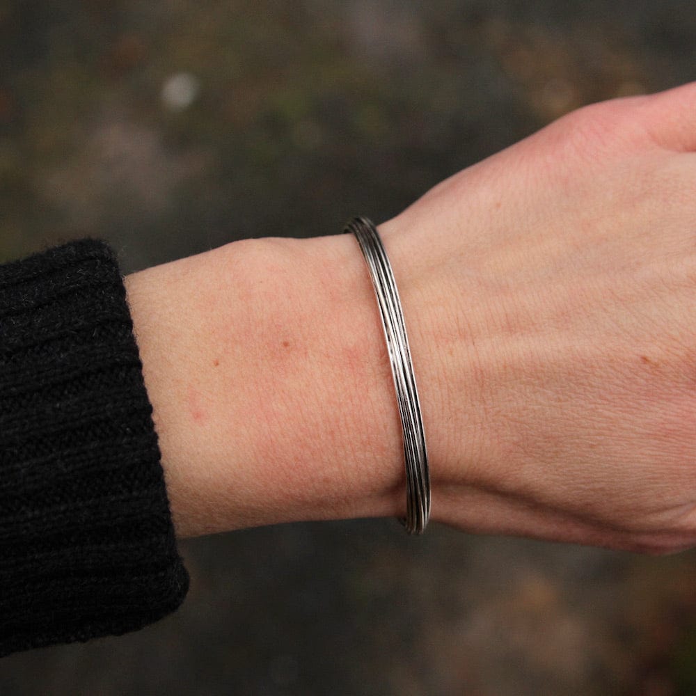 
                      
                        BRC Thin Oxidized Sterling Silver Elephant Hair Cuff
                      
                    