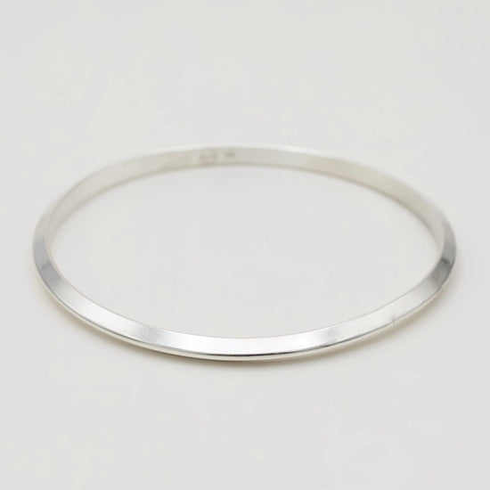 BRC Thin Triangle Bangle in Polished Silver