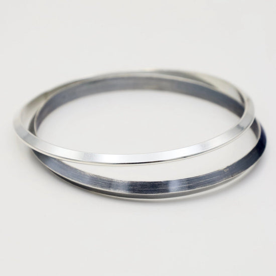 BRC Thin Triangle Bangle in Polished Silver