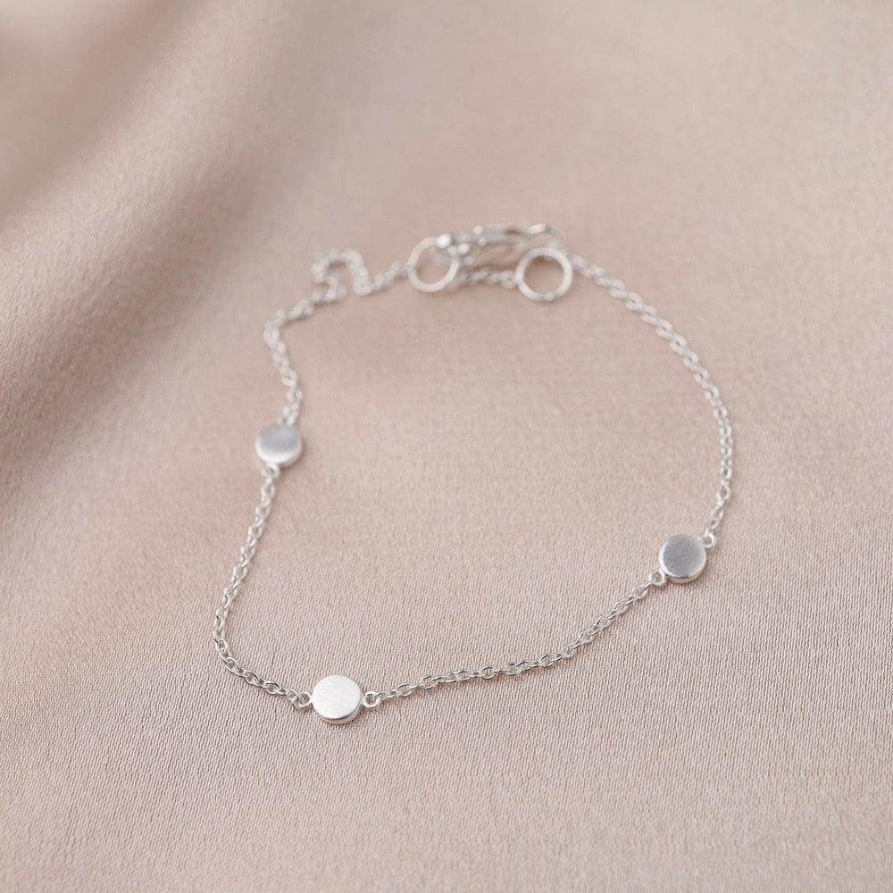 
                      
                        BRC Three Dots Bracelet in Brushed Sterling Silver
                      
                    