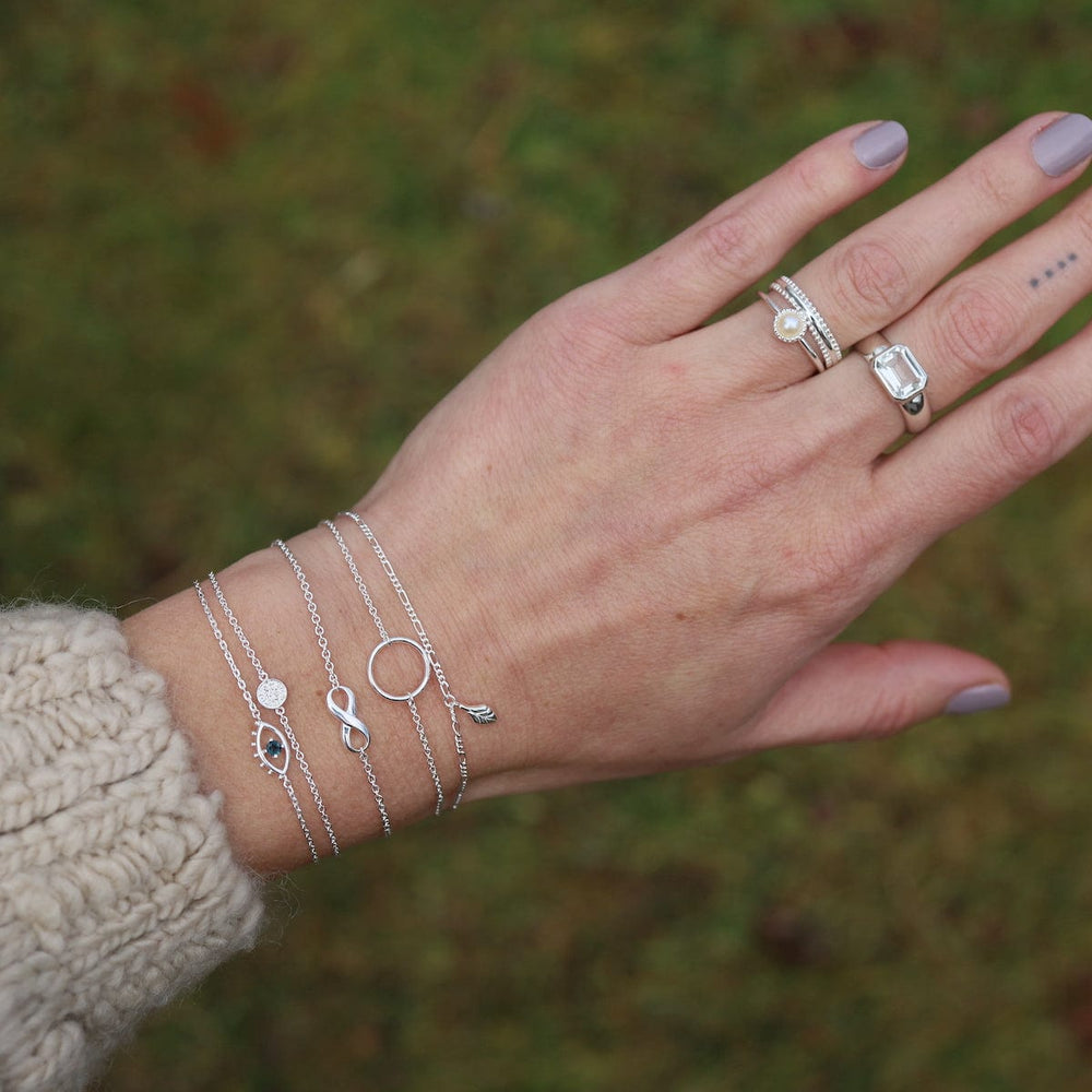 
                      
                        BRC Tiny Dangling Leaf on Figaro Chain Bracelet
                      
                    