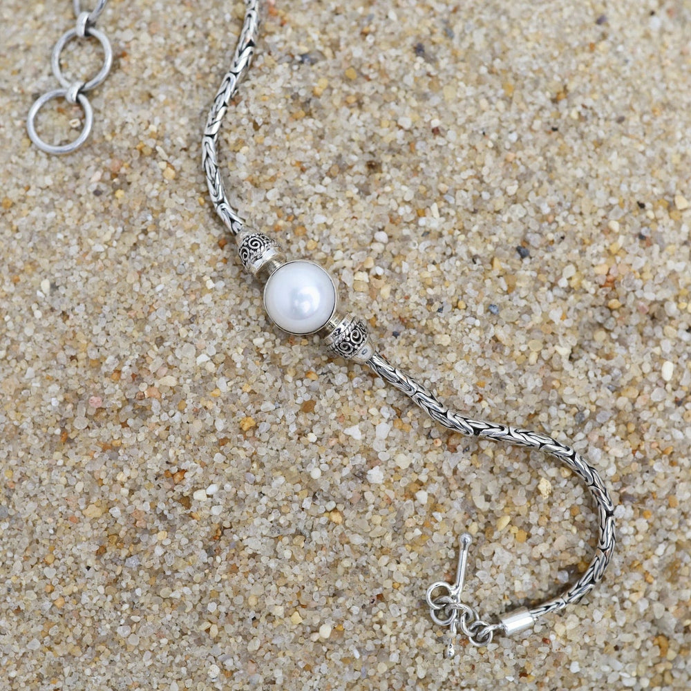 
                      
                        BRC Traditional Silver Link Bracelet with Pearl
                      
                    