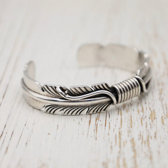 BRC Two Feather Center Twist Cuff
