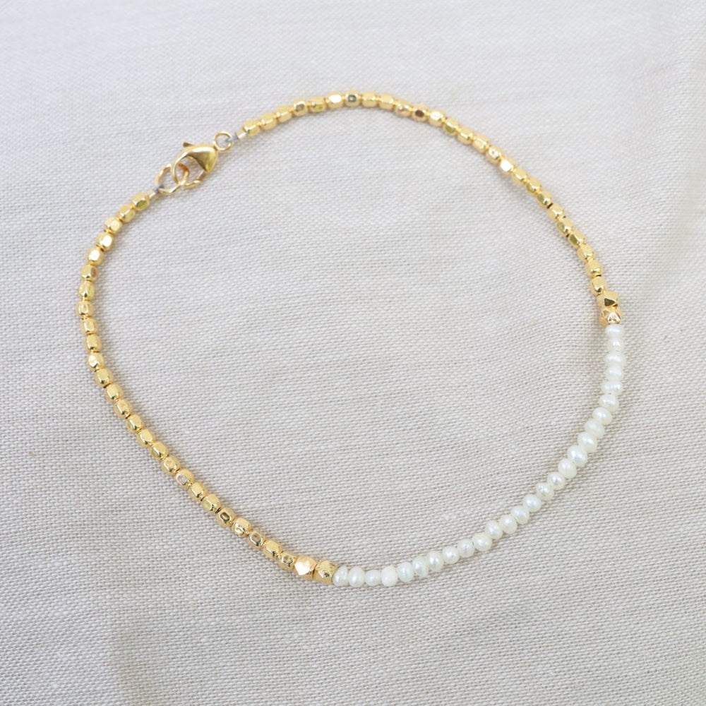 
                  
                    BRC-VRM Gemstone Rondelle Bracelet in Keishi Pearl
                  
                