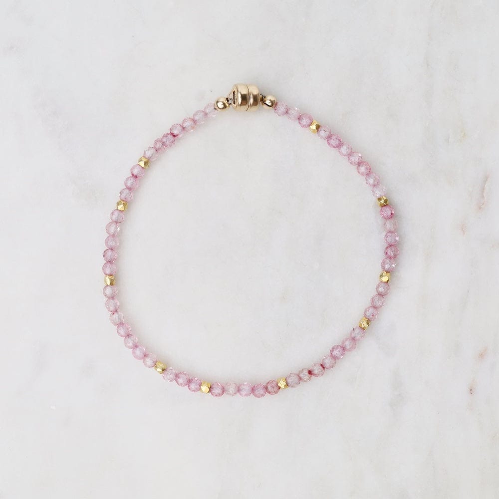 
                      
                        BRC-VRM Single Strand Pink Topaz Bracelet with Gold Bead A
                      
                    