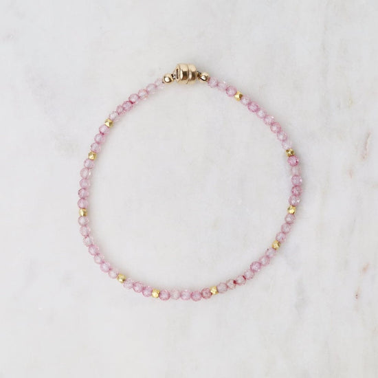 BRC-VRM Single Strand Pink Topaz Bracelet with Gold Bead A