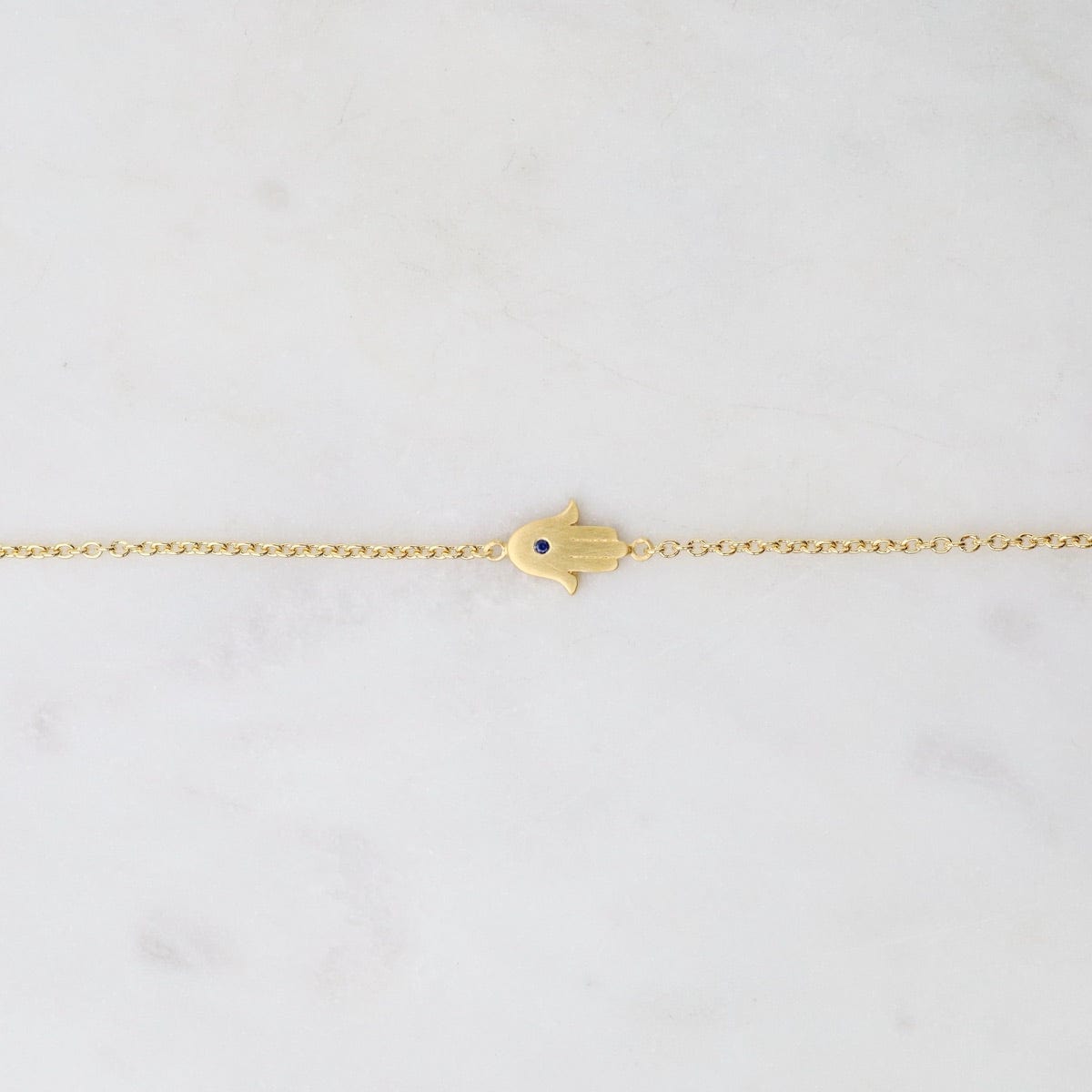 BRC-VRM Tiny Hamsa Hand with Sapphire Bracelet- Brushed Gold Vermeil