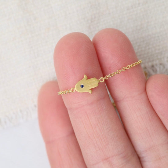 Load image into Gallery viewer, BRC-VRM Tiny Hamsa Hand with Sapphire Bracelet- Brushed Gold Vermeil
