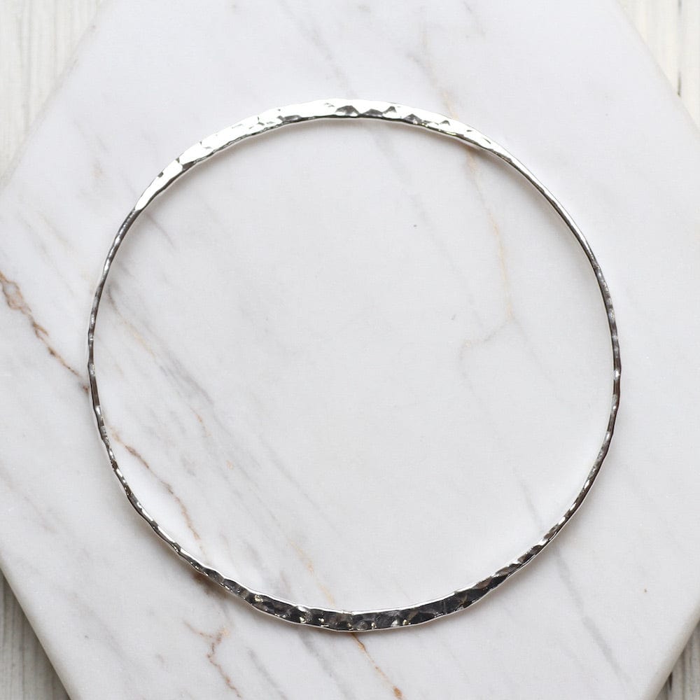 
                  
                    BRC Wafer Thin Hammered Bangle
                  
                