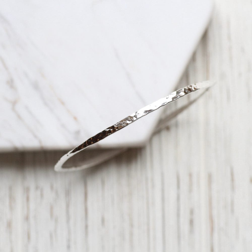 
                  
                    BRC Wafer Thin Hammered Bangle
                  
                