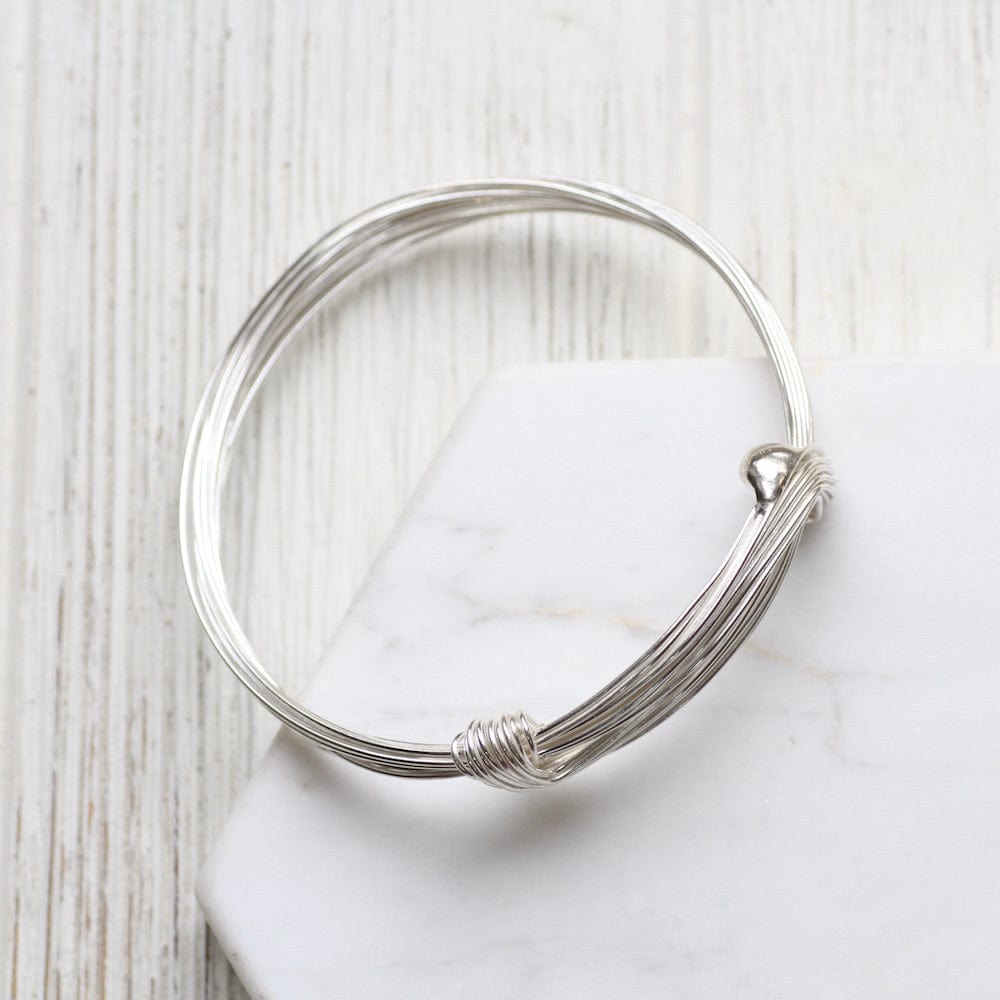 
                  
                    BRC Wide Elephant Hair Inspired Bangle
                  
                