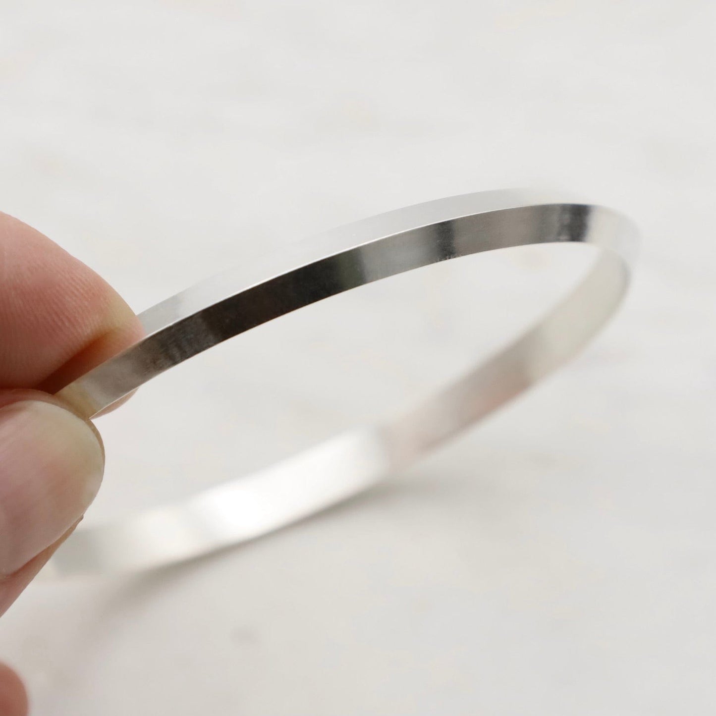 BRC Wide Triangle Bangle in Polished Silver