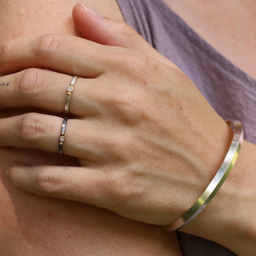 
                  
                    BRC Wide Triangle Bangle in Polished Silver
                  
                