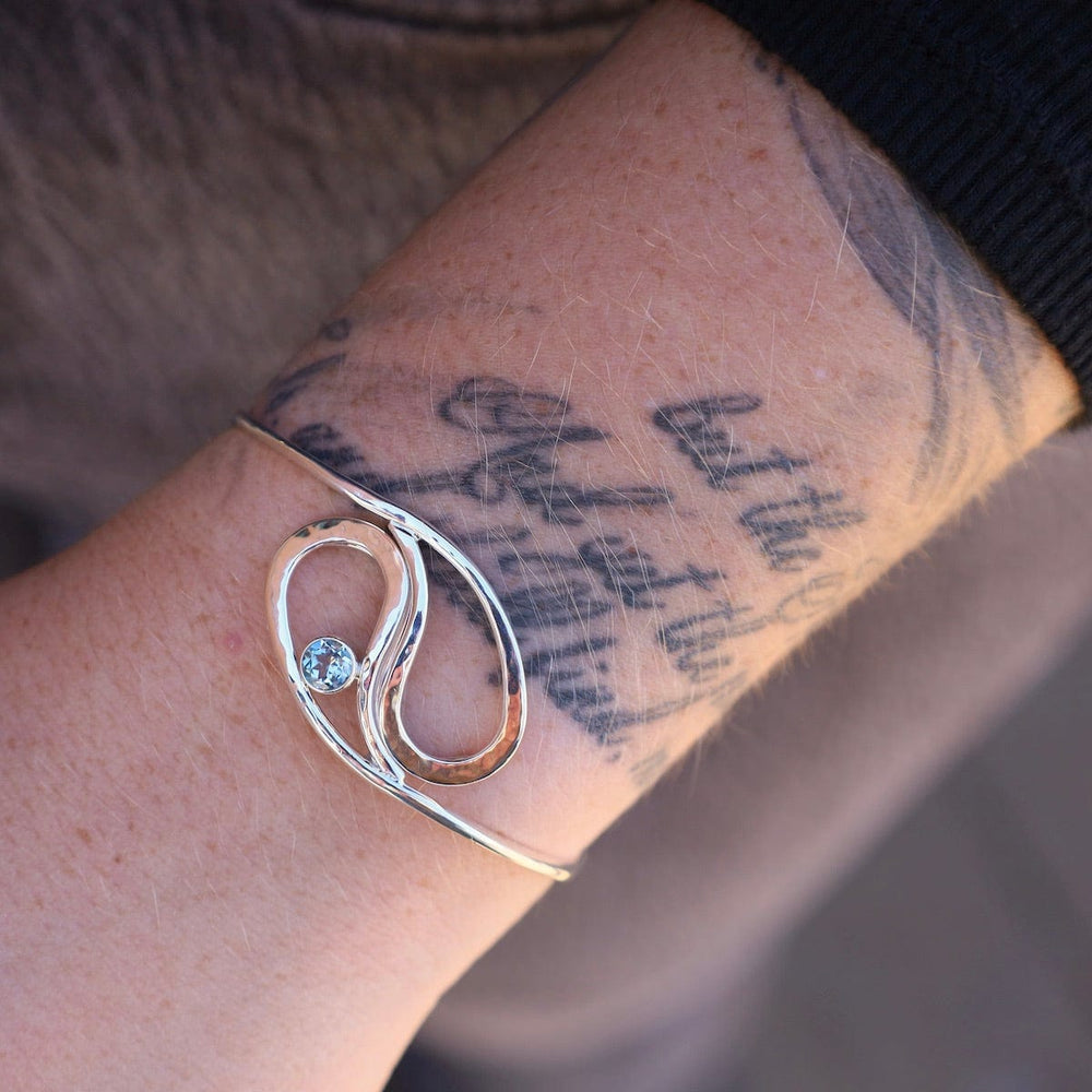 
                      
                        BRC Yin Yang Bracelet with Blue Topaz
                      
                    