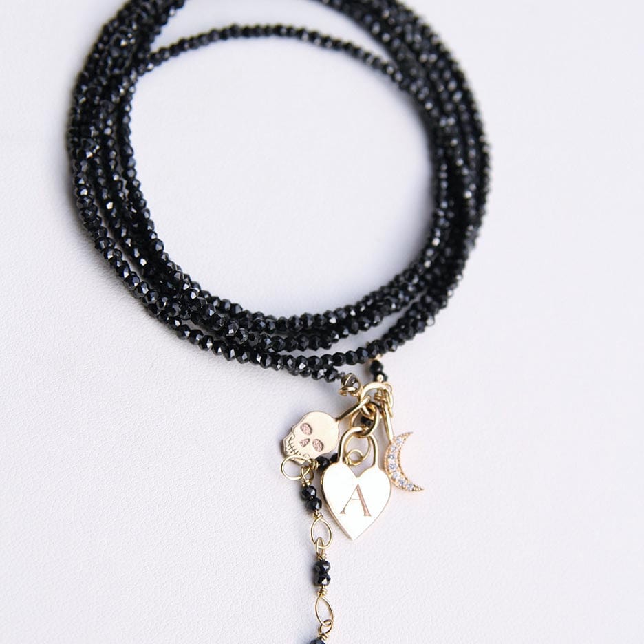 CHM-14K 14K GOLD MIDI BITTY SKULL CHARM