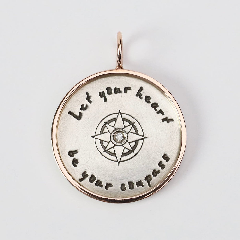 
                  
                    CHM-14K Let Your Heart Be Your Compass Round Charm
                  
                