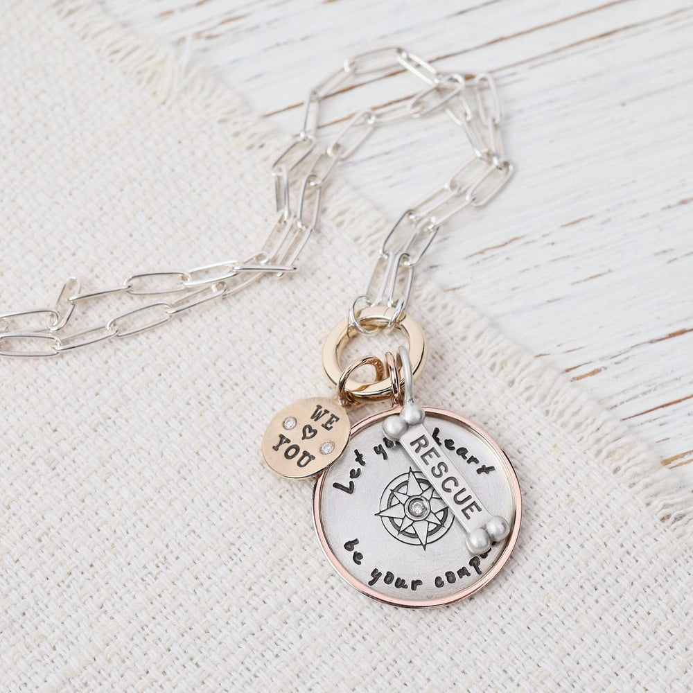 
                  
                    CHM-14K Let Your Heart Be Your Compass Round Charm
                  
                