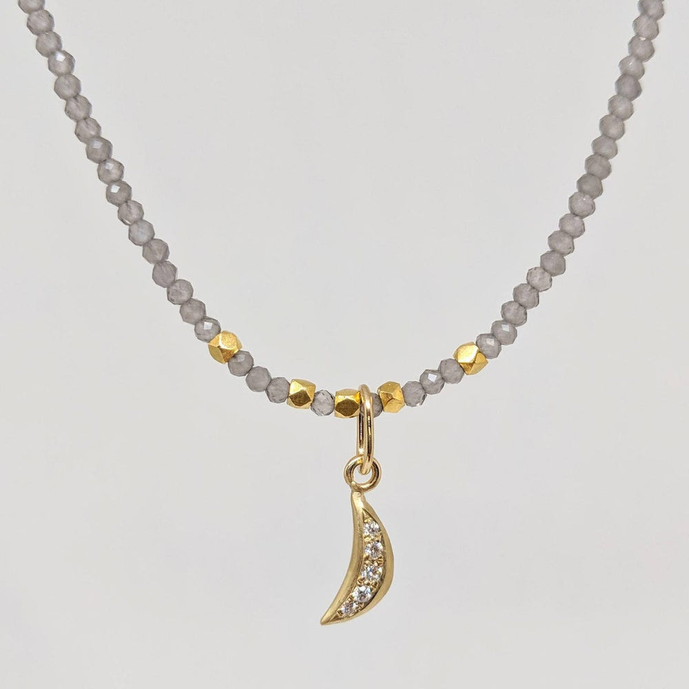 
                      
                        CHM-18K Tiny Crescent Moon Charm
                      
                    