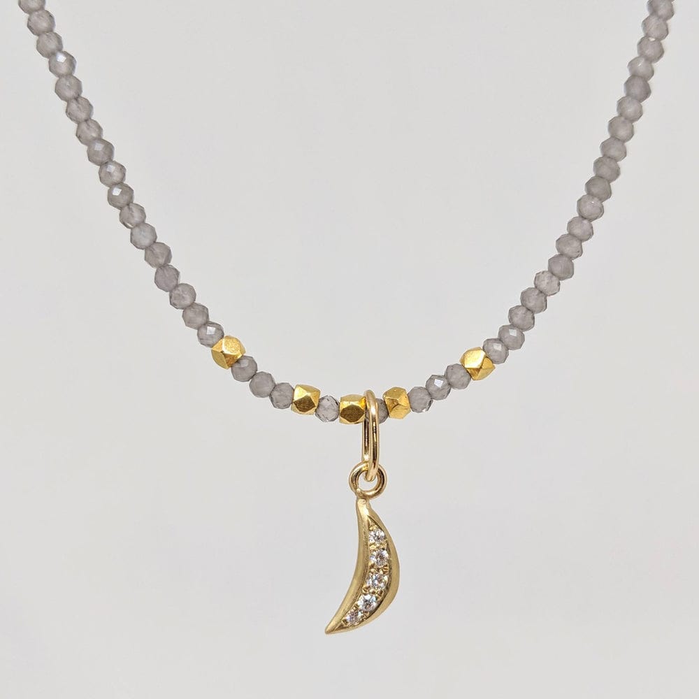 
                      
                        CHM-18K Tiny Crescent Moon Charm with Diamonds 18k Yellow
                      
                    