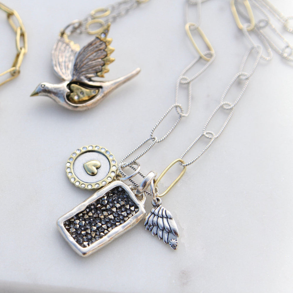 
                  
                    CHM Carry You Forever Wing Charm
                  
                