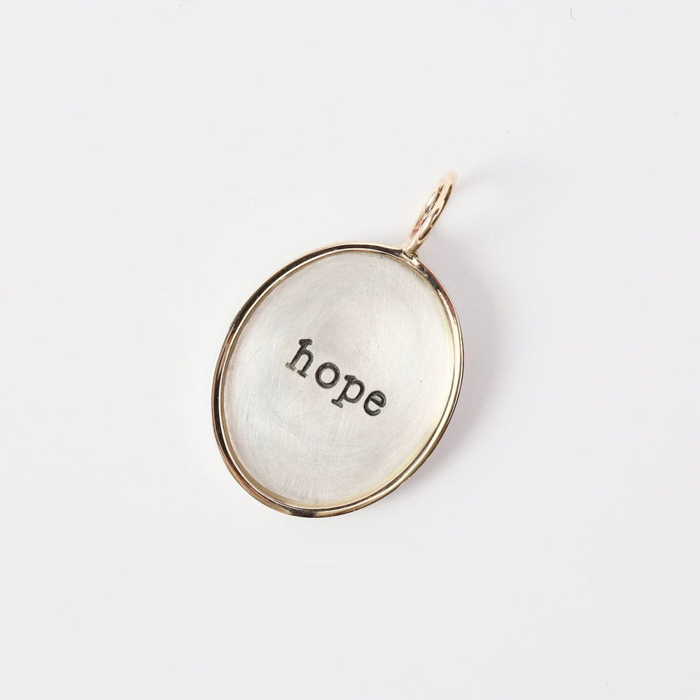 
                  
                    CHM "hope" Sterling Silver and 14K Gold Charm
                  
                