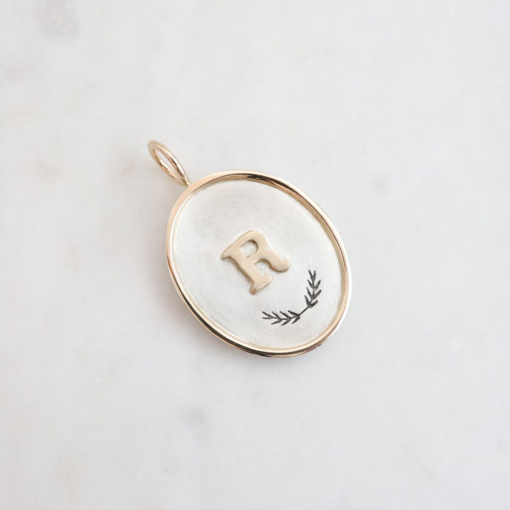 
                  
                    CHM Initial Oval Charm
                  
                