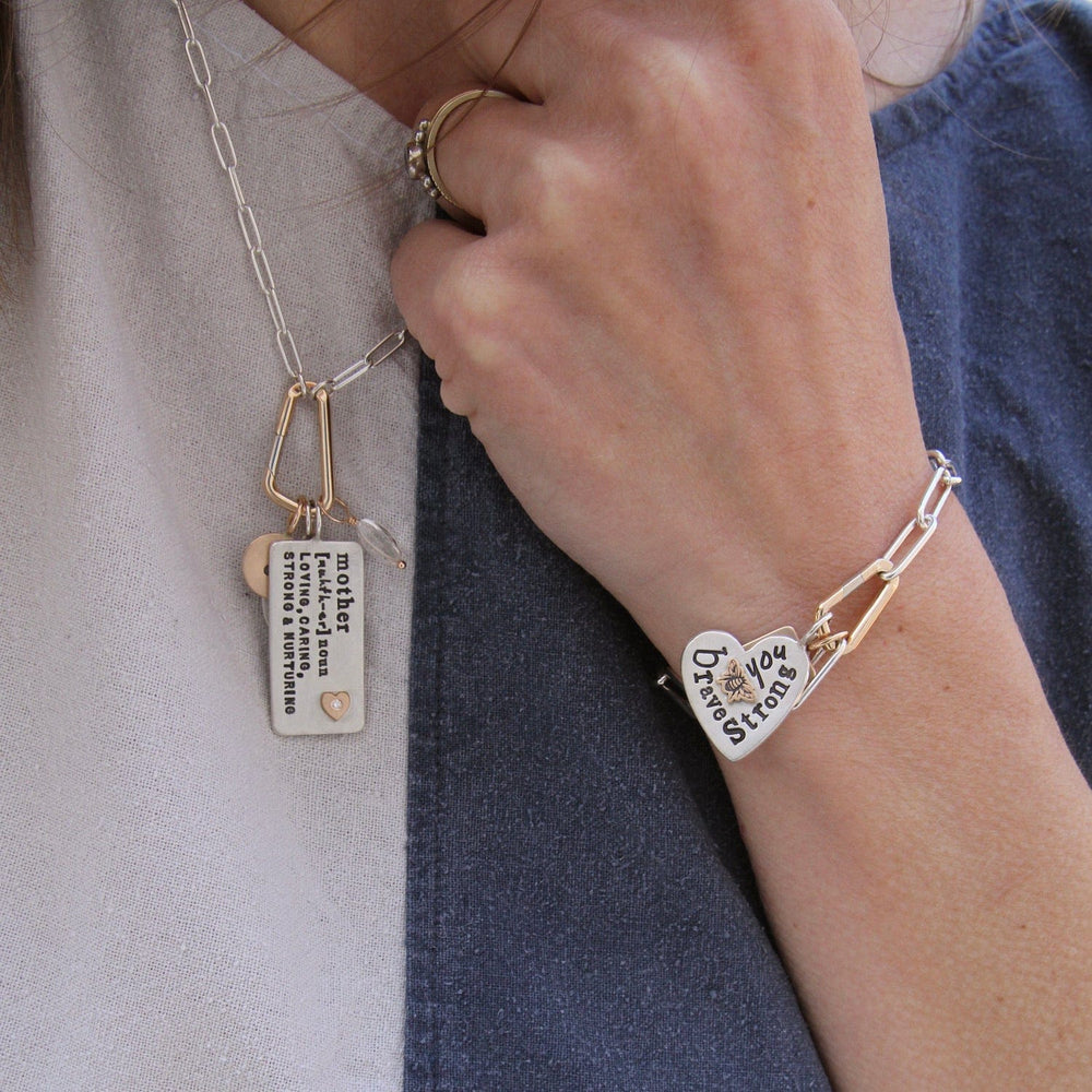 
                  
                    CHM Mother Definition ID Tag Charm
                  
                