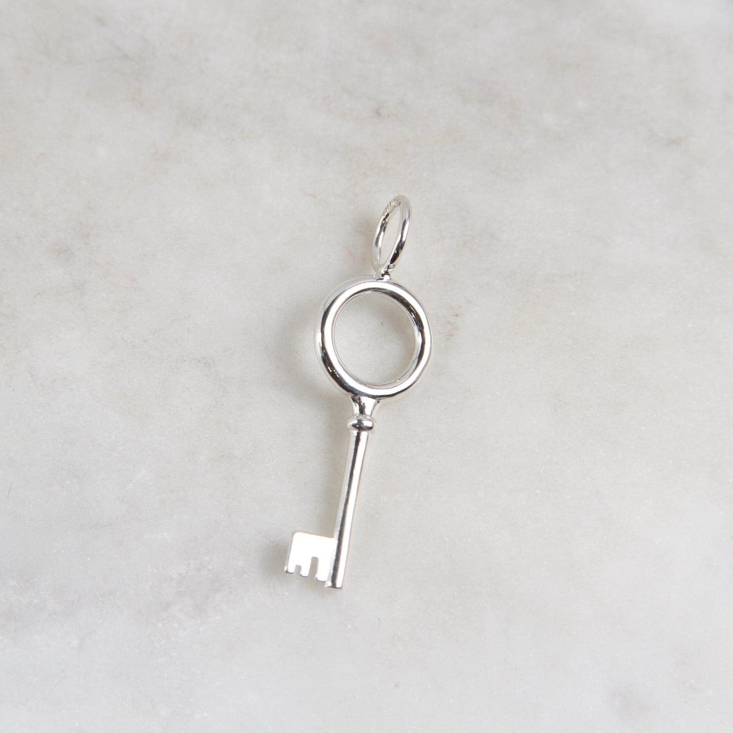 Load image into Gallery viewer, CHM Silver Skate Key Charm
