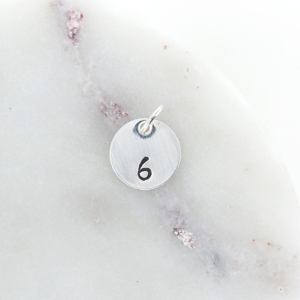 
                  
                    CHM Small Sterling Silver Disk With Number Stamp
                  
                