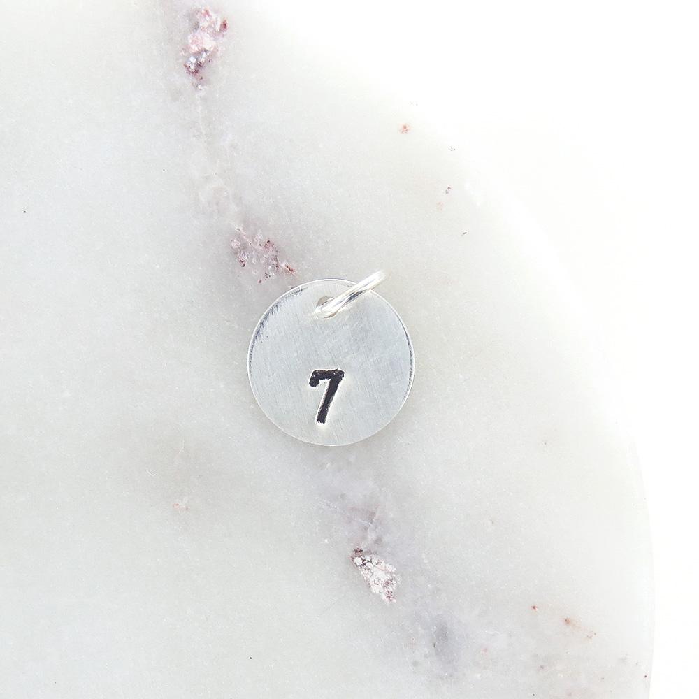 
                  
                    CHM Small Sterling Silver Disk With Number Stamp
                  
                