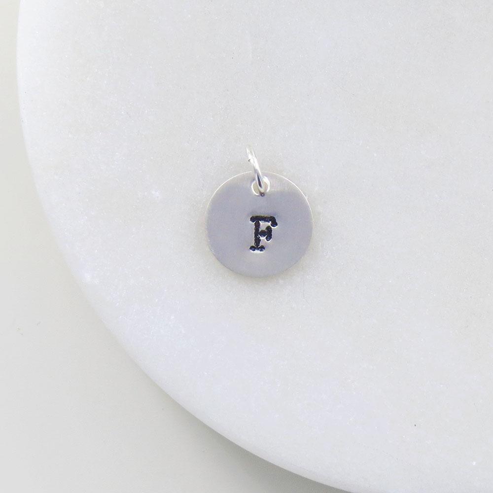 
                  
                    CHM Small Sterling Silver Hand Stamped Letter Charm
                  
                