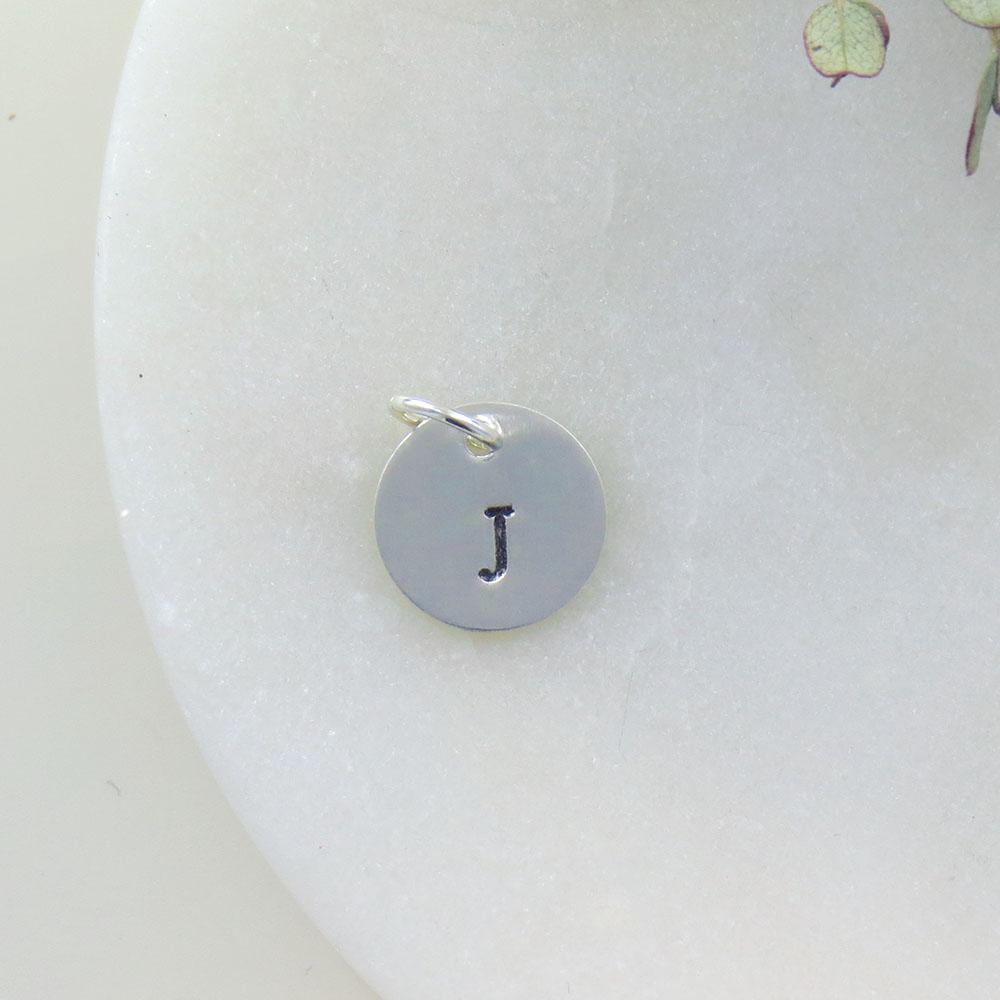 
                  
                    CHM Small Sterling Silver Hand Stamped Letter Charm
                  
                