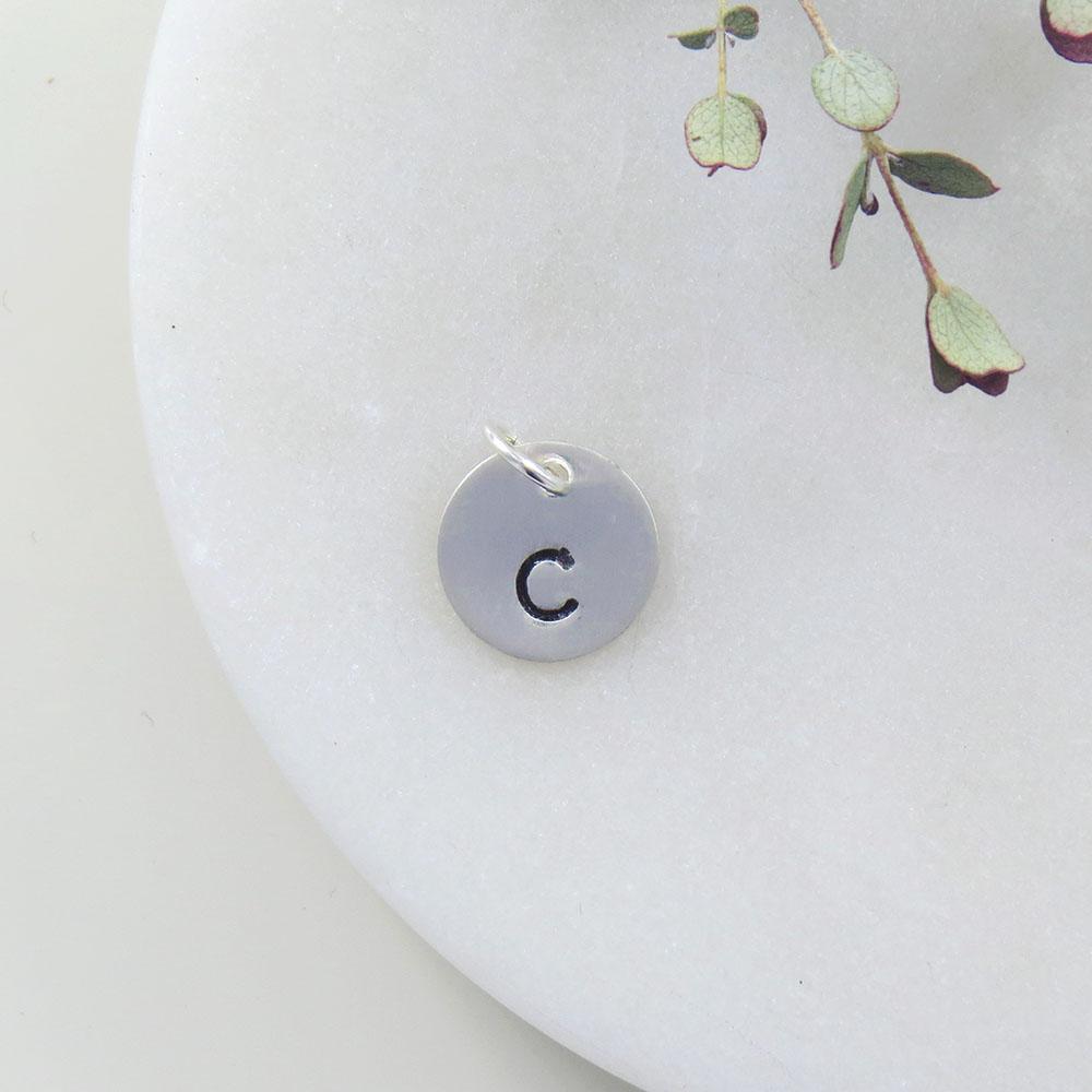 
                  
                    CHM Small Sterling Silver Hand Stamped Letter Charm
                  
                