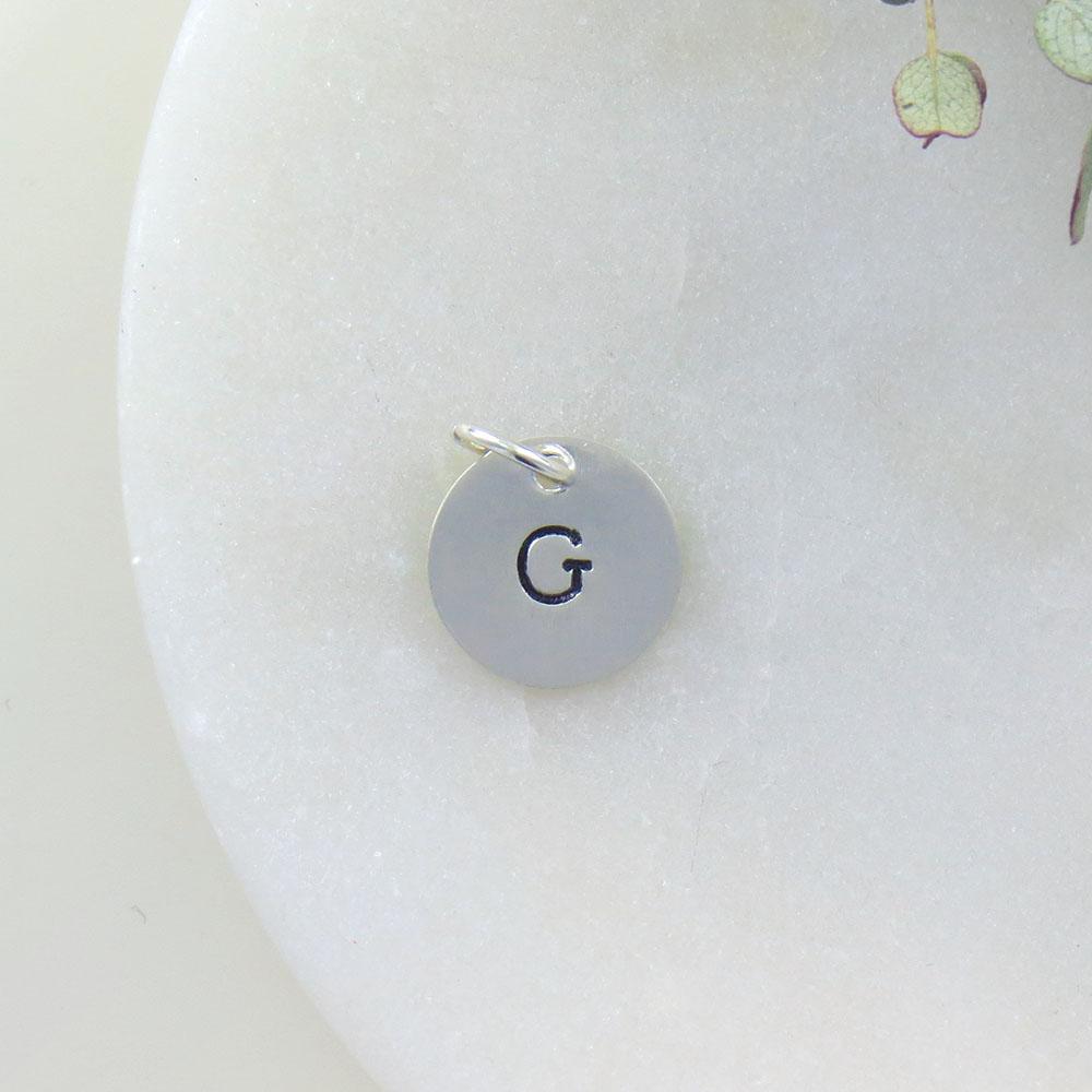 
                  
                    CHM Small Sterling Silver Hand Stamped Letter Charm
                  
                