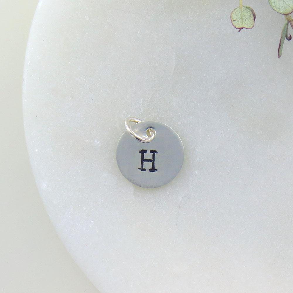 
                  
                    CHM Small Sterling Silver Hand Stamped Letter Charm
                  
                