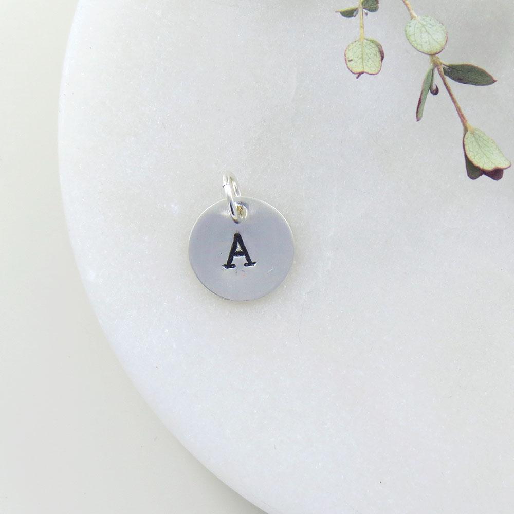 
                  
                    CHM Small Sterling Silver Hand Stamped Letter Charm
                  
                