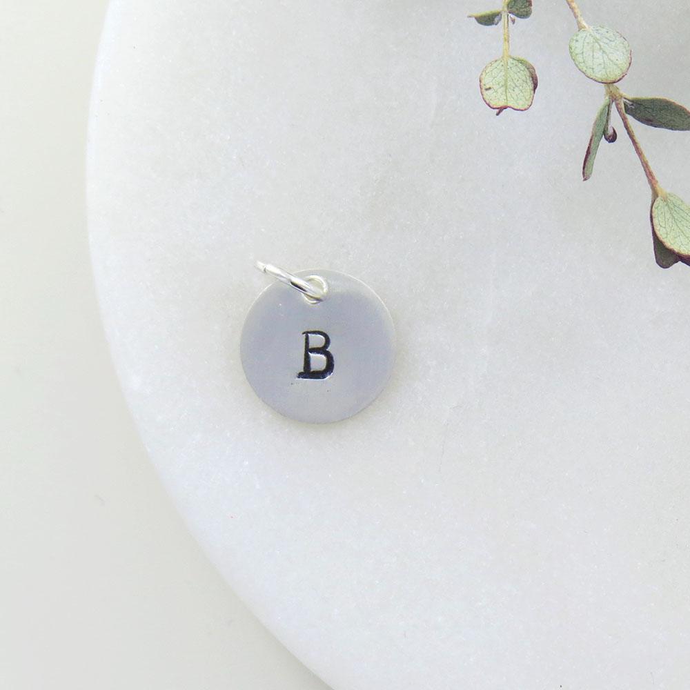 
                  
                    CHM Small Sterling Silver Hand Stamped Letter Charm
                  
                