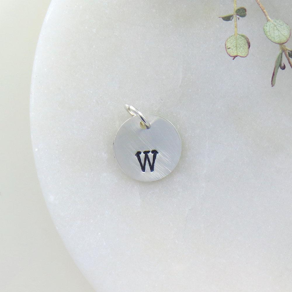 
                  
                    CHM Small Sterling Silver Hand Stamped Letter Charm
                  
                