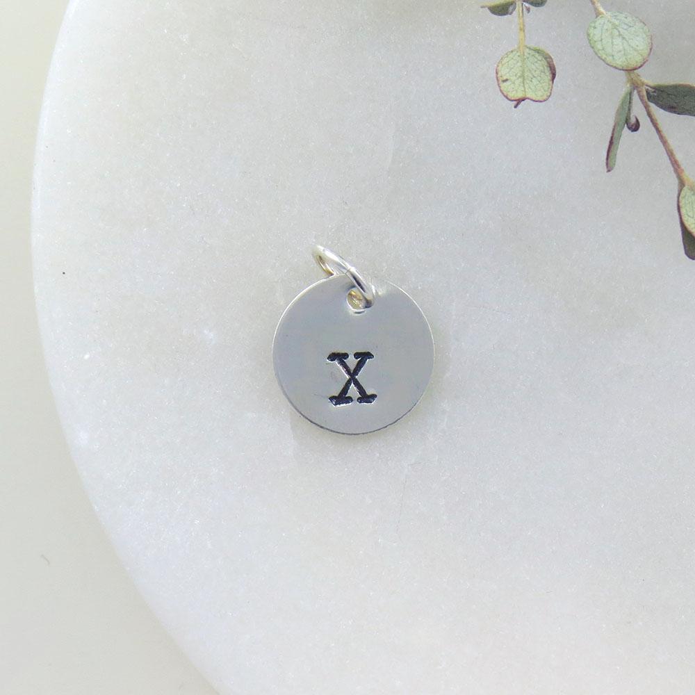 
                  
                    CHM Small Sterling Silver Hand Stamped Letter Charm
                  
                