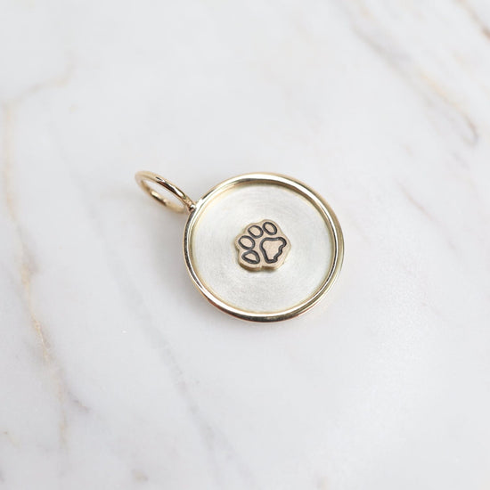 CHM Stamped Raised Paw Print Charm with 14k Gold Frame