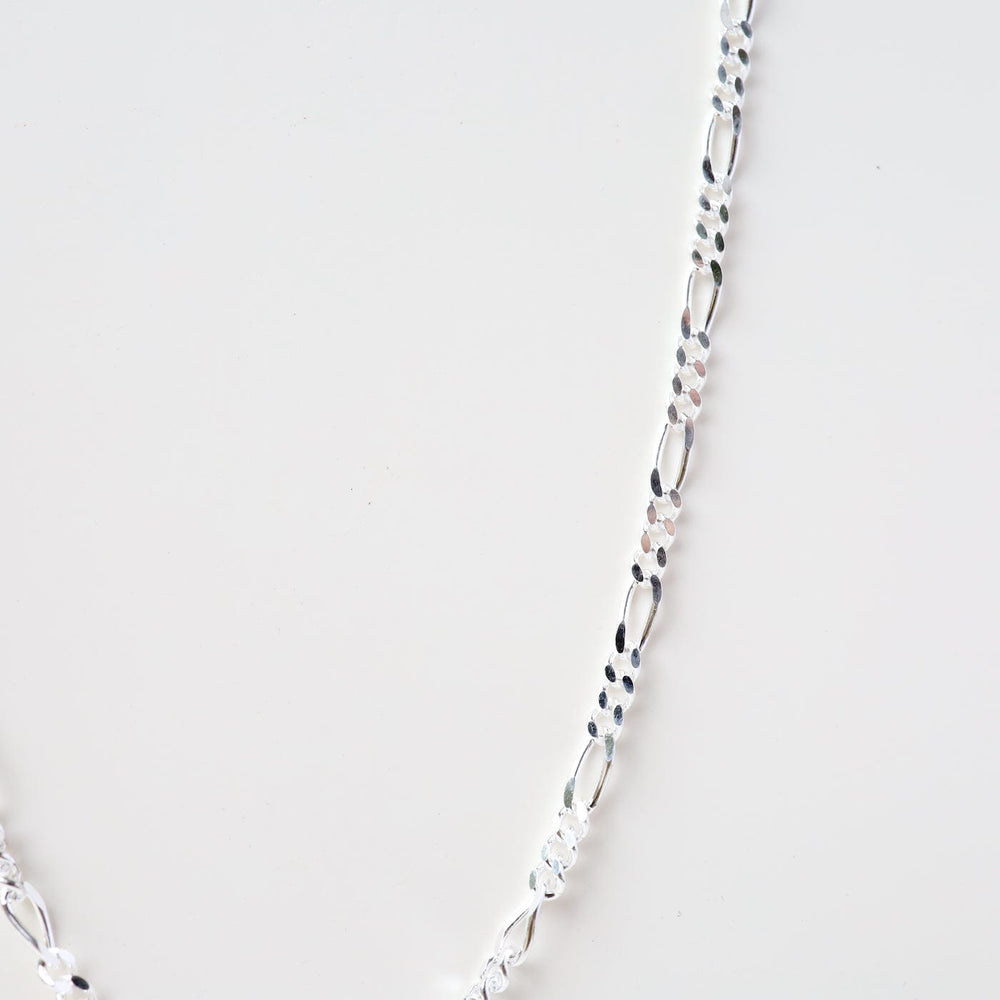 
                      
                        CHN Sterling Silver Figaro Chain - 20"
                      
                    