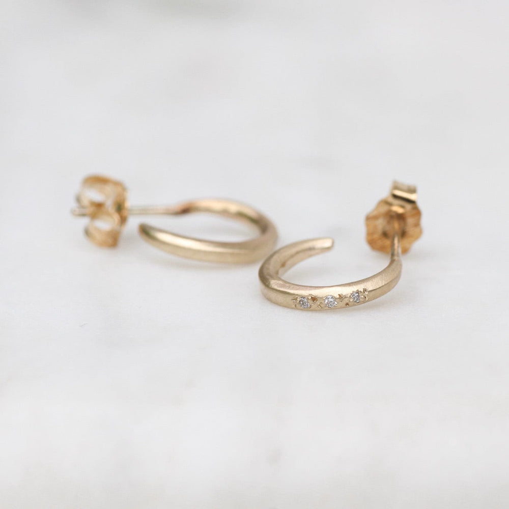 
                      
                        EAR-10K 10k Gold Pave Hug Hoops
                      
                    