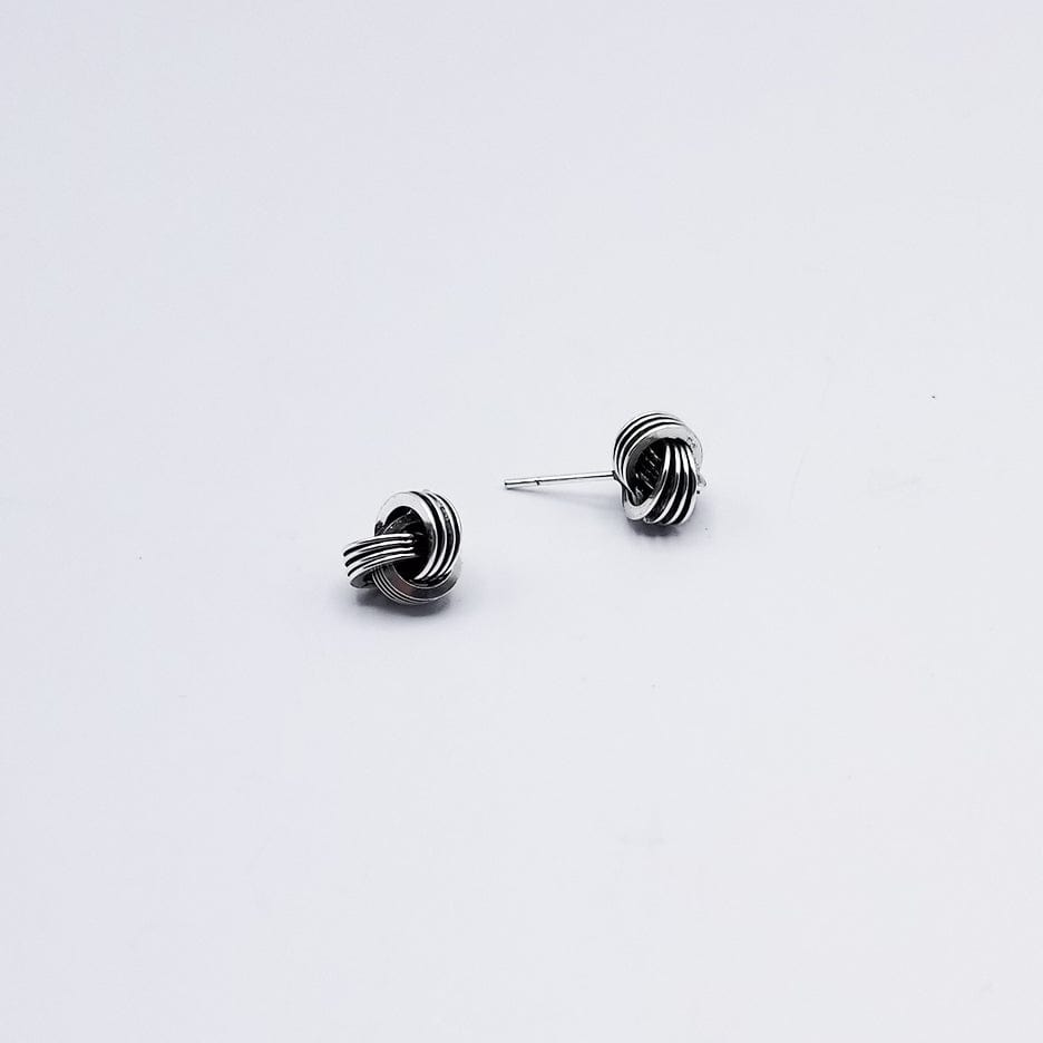 
                      
                        EAR 10mm OXIDIZED STERLING SILVER KNOT
                      
                    